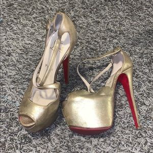 Gold, red bottom, Christian Louboutin’s.